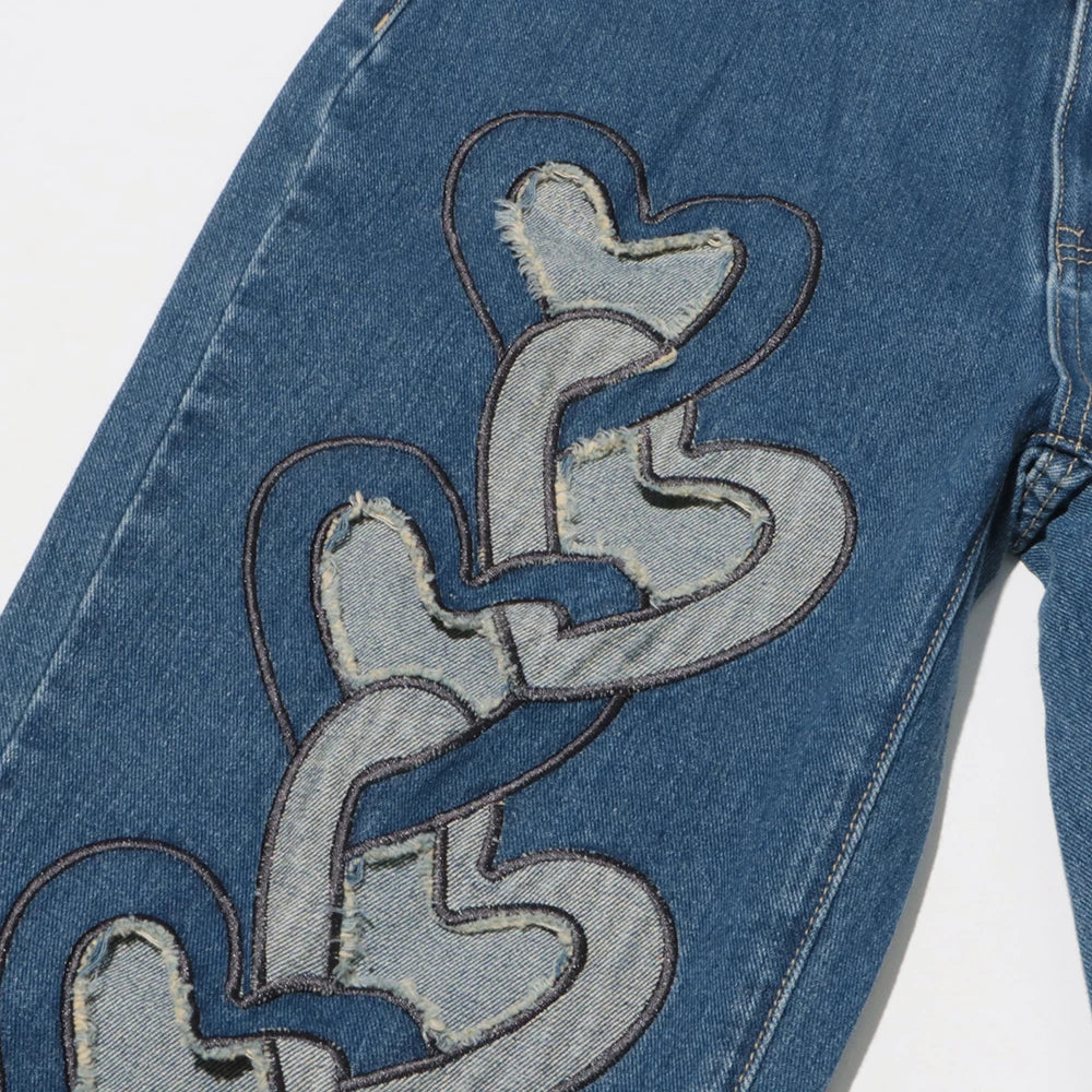 European and American sexy spicy style pants, casual and fashionable heart-shaped hollow high waisted jeans, women's trend