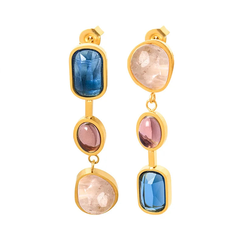 Female earrings with contrasting crystal and glass stone inlaid design